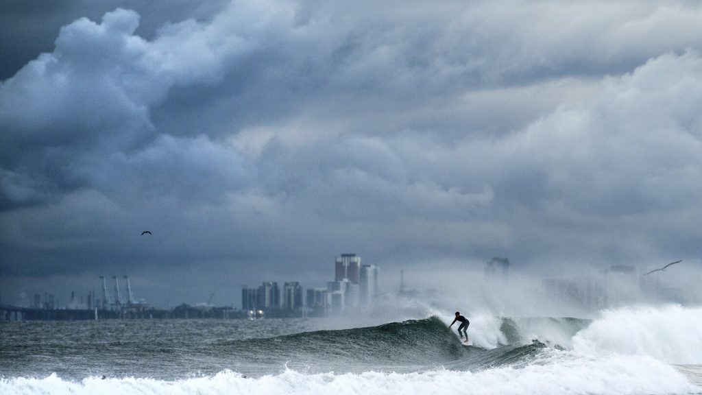 Lingering thunderstorms bring flooding risk after atmospheric river drenches much of California