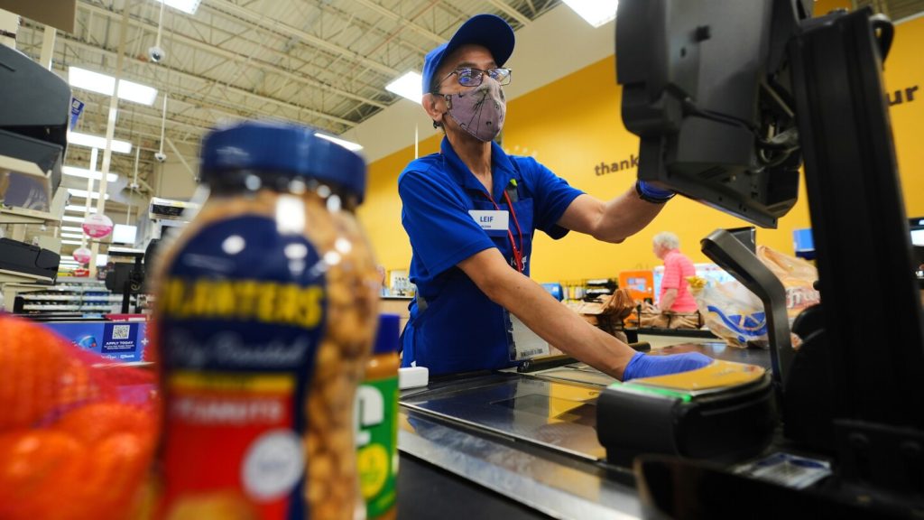 Prices ticked up in November as Americans keep spending, a key inflation measure shows