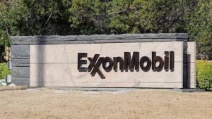 You are a headline writer for OilMarketCap.com. Write ONE new headline for this oil and gas news story. Rules: under 60 characters, investor-focused, no clickbait, no character counts, no options, no explanations. Return the headline only — nothing else. Story title: Exxon Mobil Signals $2.9B Q1 Earnings Bump On Higher Oil Prices