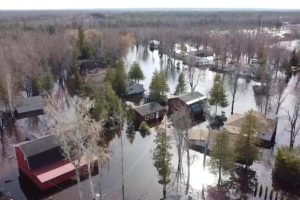 You are a headline writer for OilMarketCap.com. Write ONE new headline for this oil and gas news story. Rules: under 60 characters, investor-focused, no clickbait, no character counts, no options, no explanations. Return the headline only — nothing else. Story title: Flooding sends chunks of ice into Michigan homes